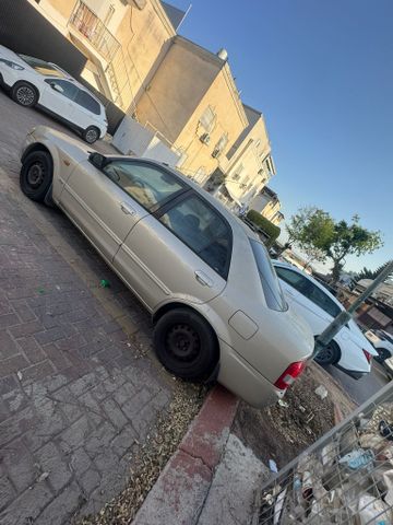 מודעת רכב מאזדה 323