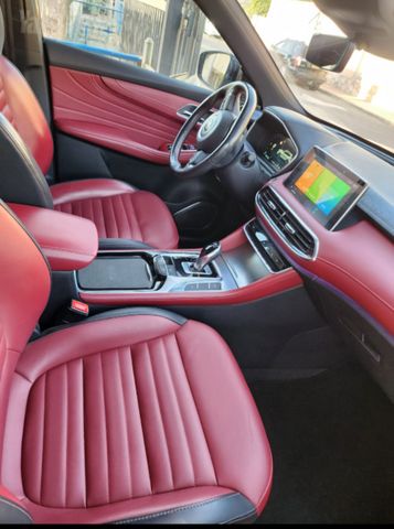 מודעת רכב אם ג'י EHS PHEV