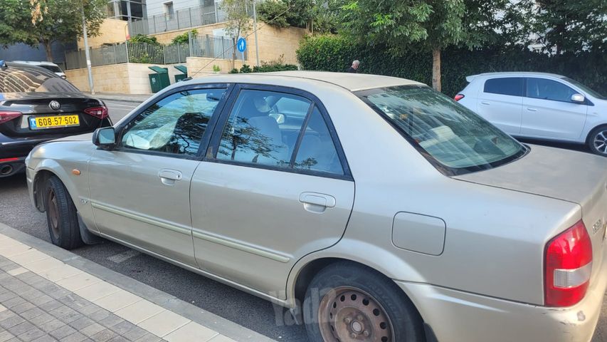 מודעת רכב מאזדה 323