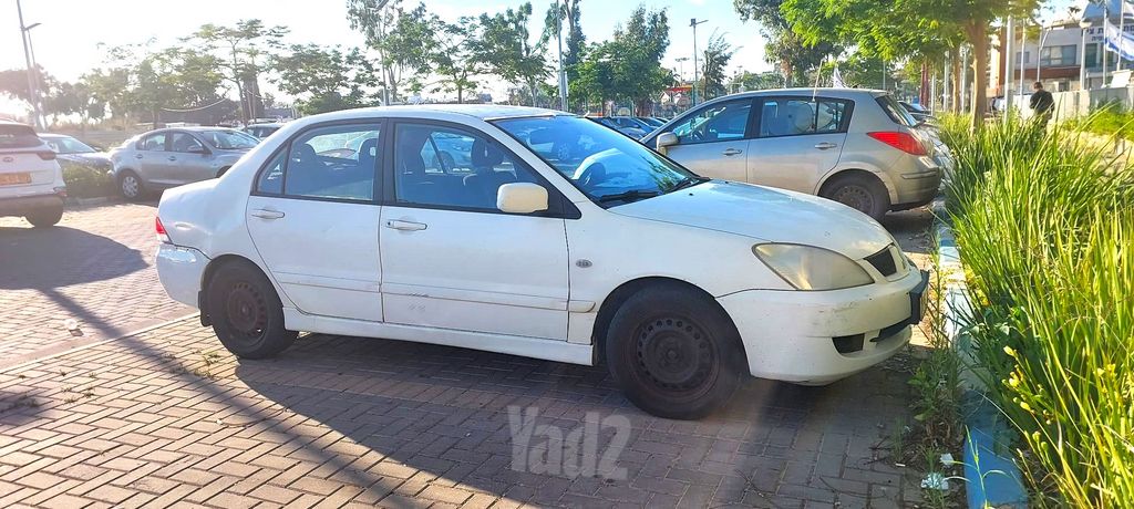 מודעת רכב מיצובישי לנסר