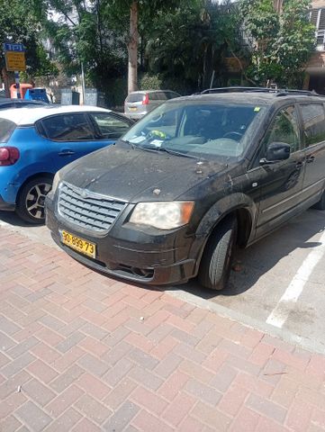 מודעת רכב קרייזלר גראנד וויאג'ר