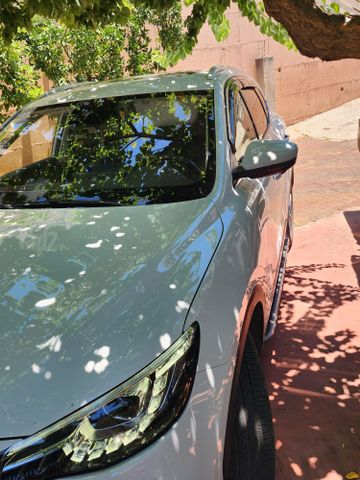 מודעת רכב אם ג'י EHS PHEV