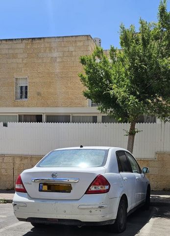 מודעת רכב ניסאן טידה