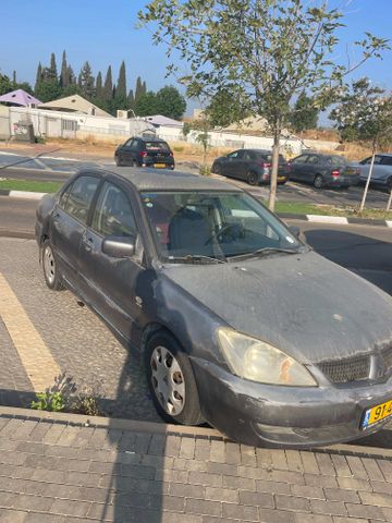 מודעת רכב מיצובישי לנסר
