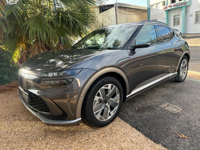 מודעת רכב ג'נסיס GV60 2