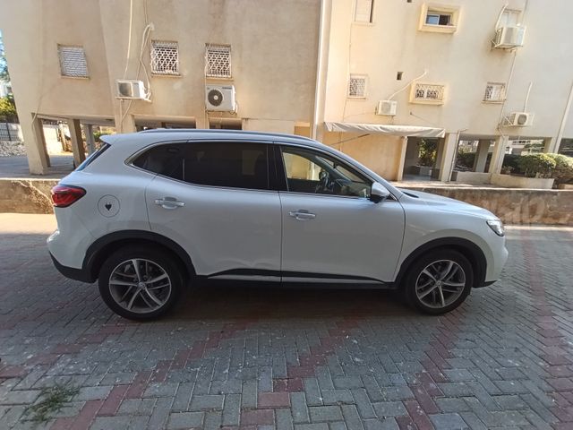 מודעת רכב אם ג'י EHS PHEV
