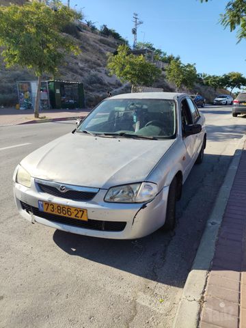 מודעת רכב מאזדה 323