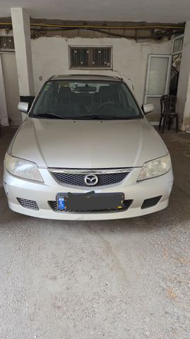 מודעת רכב מאזדה 323