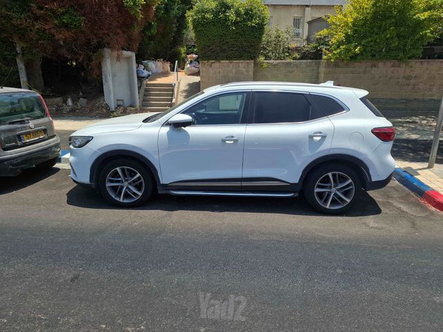 מודעת רכב אם ג'י EHS PHEV