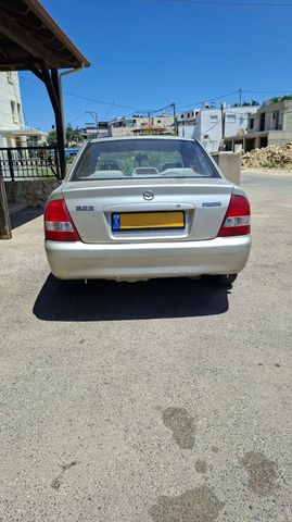 מודעת רכב מאזדה 323
