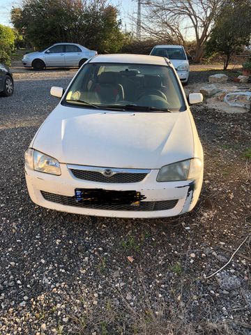 מודעת רכב מאזדה 323