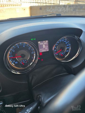 מודעת רכב קרייזלר גראנד וויאג'ר