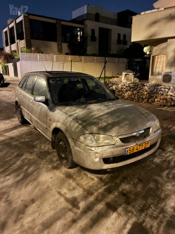 מודעת רכב מאזדה 323