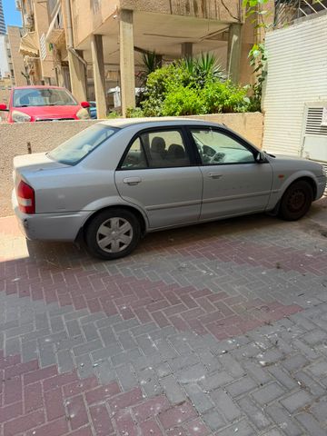 מודעת רכב מאזדה 323