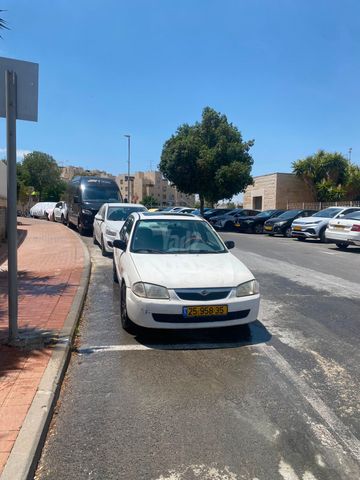 מודעת רכב מאזדה 323