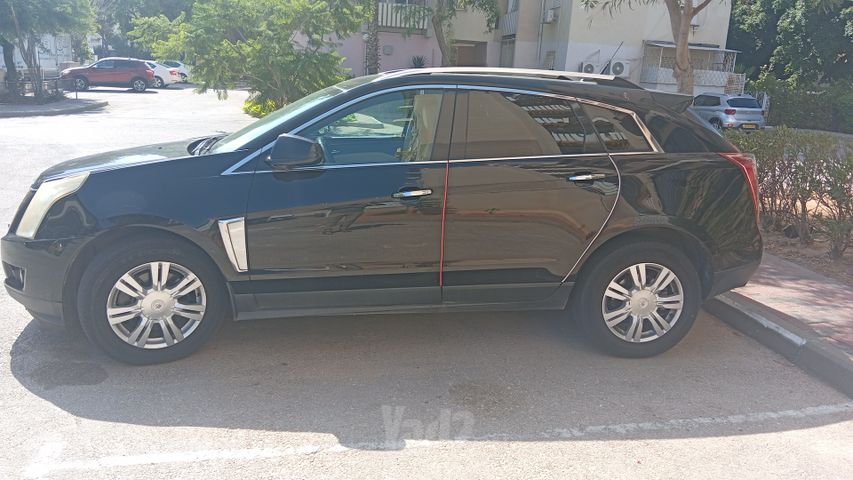 מודעת רכב קאדילק SRX