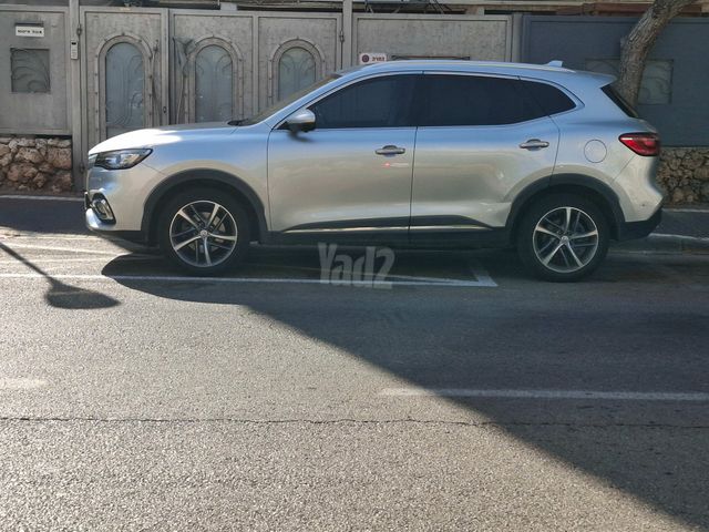 מודעת רכב אם ג'י EHS PHEV