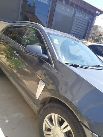 מודעת רכב קאדילק SRX