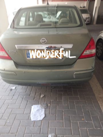 מודעת רכב ניסאן טידה