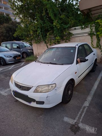 מודעת רכב מאזדה 323