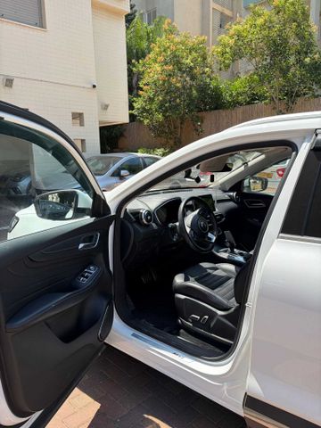 מודעת רכב אם ג'י EHS PHEV