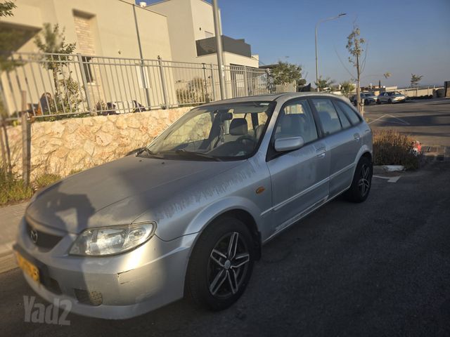 מודעת רכב מאזדה 323