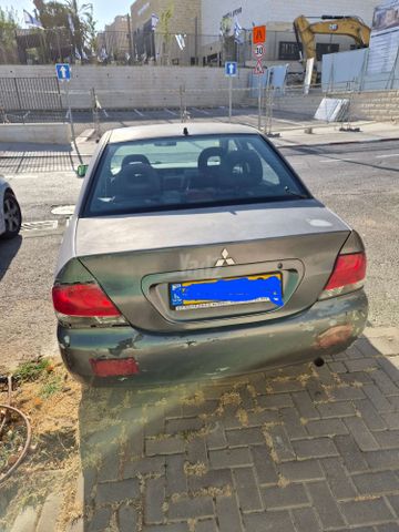 מודעת רכב מיצובישי לנסר