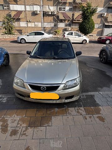 323 GLX אוט׳ סדאן 4 דל 1.6 (105 כ״ס)