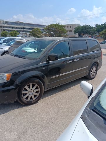 מודעת רכב קרייזלר גראנד וויאג'ר