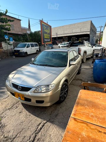 מודעת רכב מאזדה 323