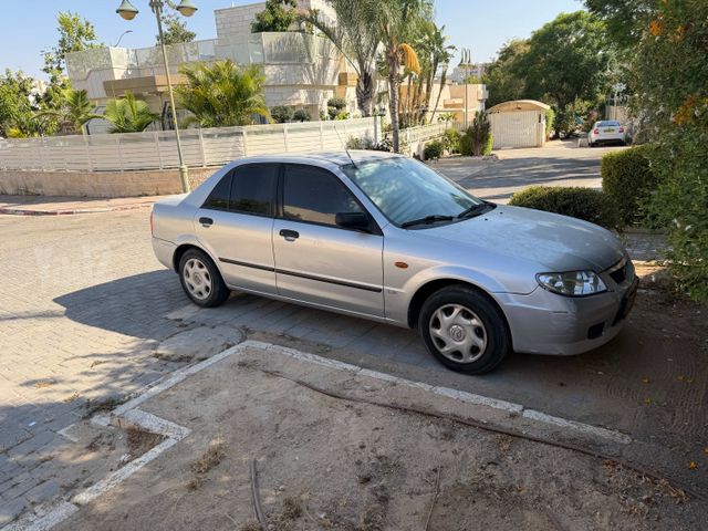 מודעת רכב מאזדה 323