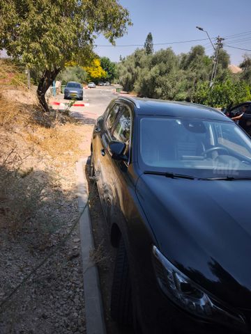 מודעת רכב אם ג'י EHS PHEV