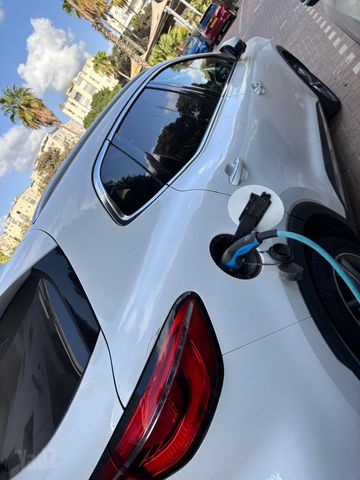 מודעת רכב אם ג'י EHS PHEV
