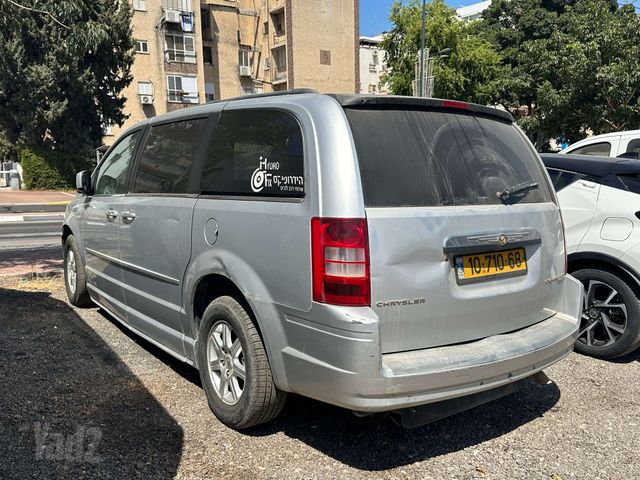 מודעת רכב קרייזלר גראנד וויאג'ר 1