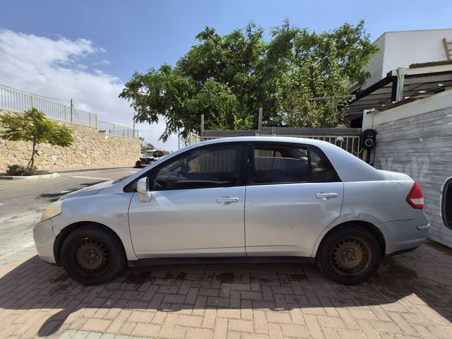 טידה Business אוט׳ סדאן 4 דל 1.6 (110 כ״ס)