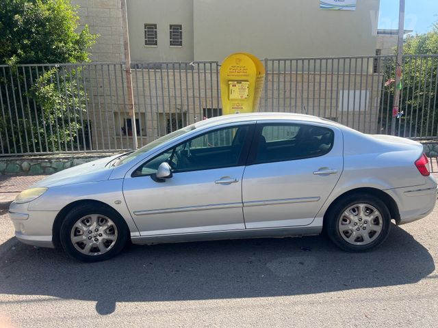 פיג'ו 407