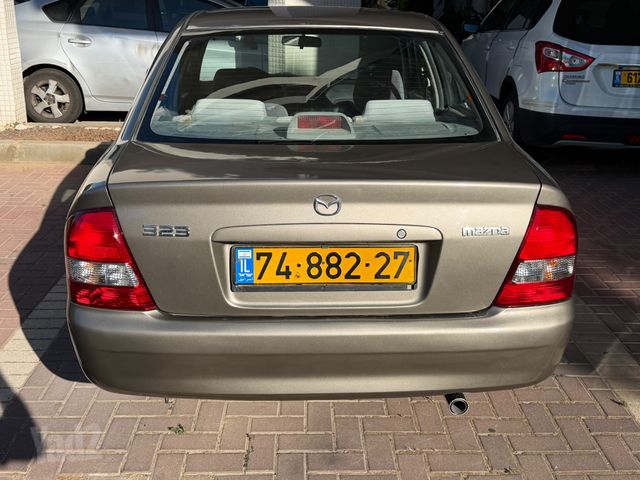 מודעת רכב מאזדה 323