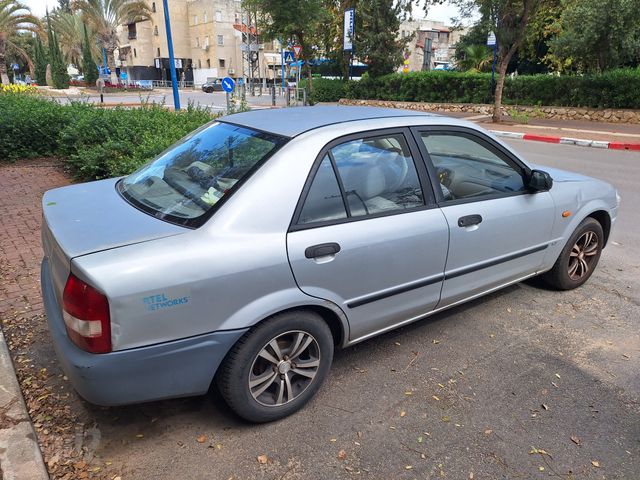 מודעת רכב מאזדה 323